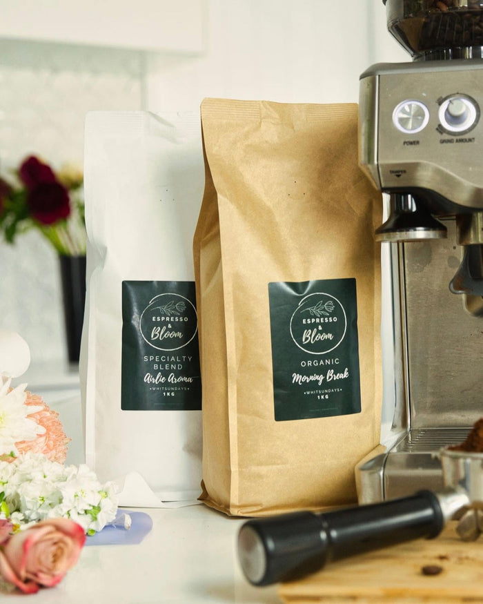 Espresso and Bloom coffee bags with fresh flowers